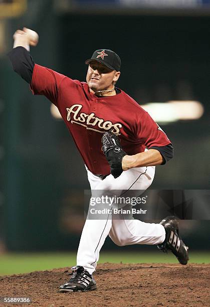 Winning pitcher Roger Clemens of the Houston Astros pitches in the 18th inning against the Atlanta Braves in Game Four of the 2005 National League...