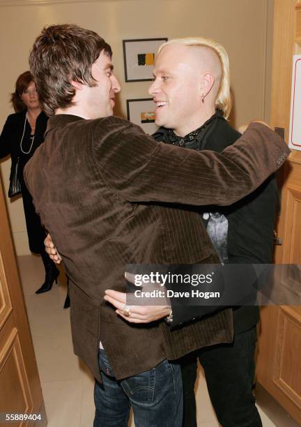 Oasis member Noel Gallagher and Prodigy member Keith Flint attend The Q Awards, the annual magazine's music awards, at Grosvenor House on October 10,...