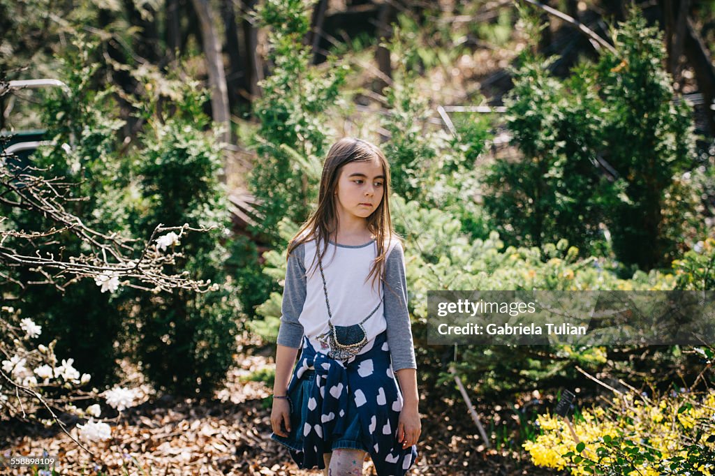 Exploring Small Small Girl Exploring Nature In The Park High-Res Stock Photo - Getty Images