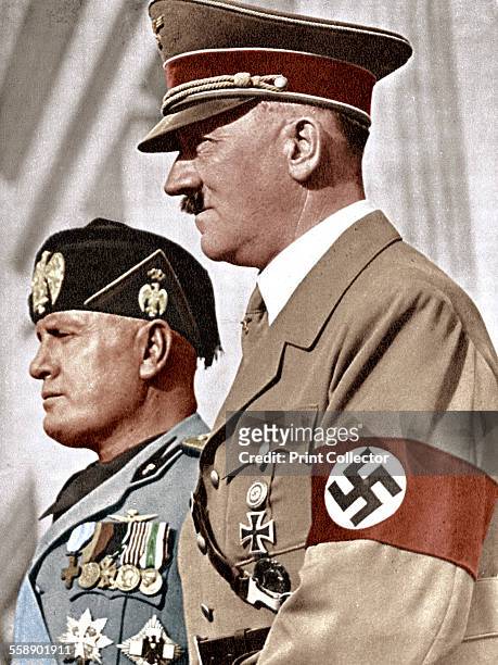 Adolph Hitler and Benito Mussolini , German and Italian fascist dictators. .