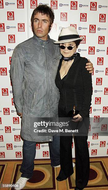 Liam Gallagher and Yoko Ono pose with the award in the awards room after she collected The Q Special Award for the work of her late husband John...