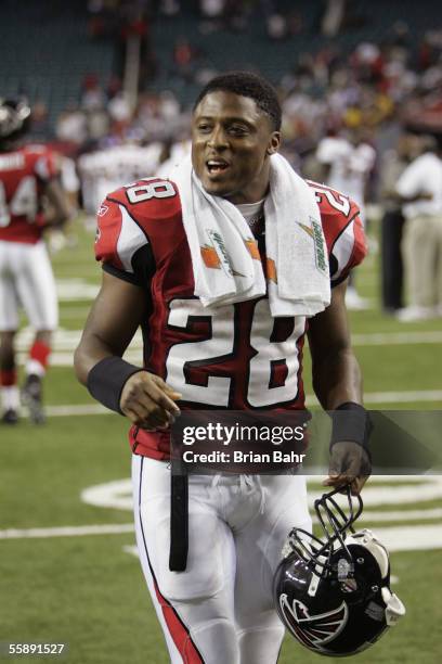 Warrick Dunn of the Atlanta Falcons walks back to the locker room after defeating the Minnesota Vikings on October 2, 2005 at the Georgia Dome in...