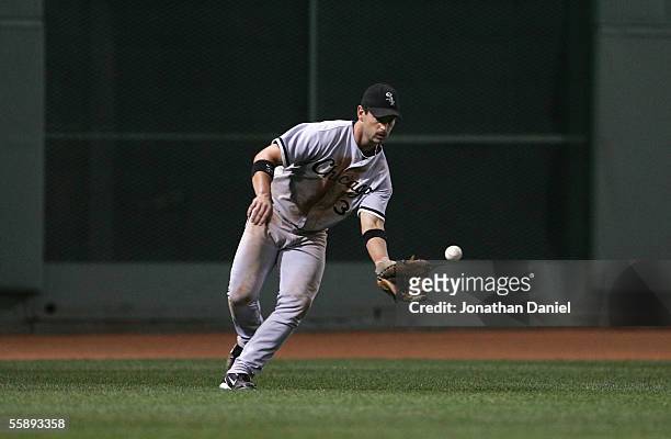 Outfielder Aaron Rowand of the Chicago White Sox fields a single hit from the Boston Red Sox during Game Three of the American League Division Series...