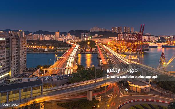 tsingyi bridge at night with light trail - tsing_yi stock pictures, royalty-free photos & images