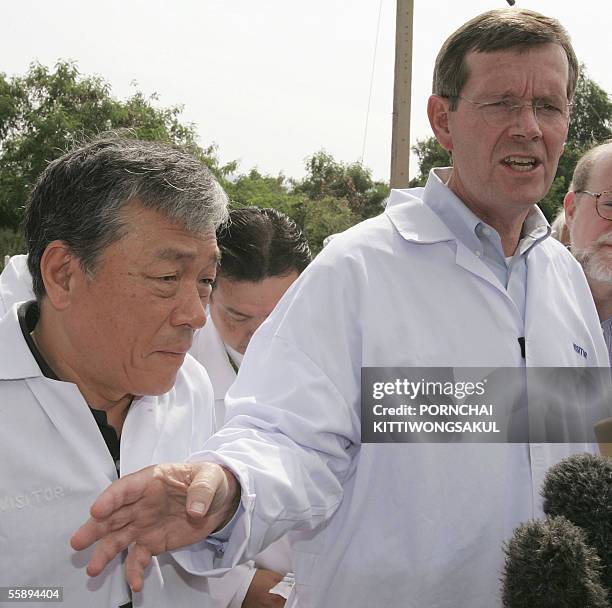 Health Secretary Michael Leavitt answers a question from the press next to World Health Organisation Director General Jong Wook Lee during their...