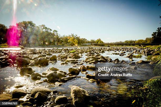 overview of a large group of rocks in the river - andres ruffo stock-fotos und bilder