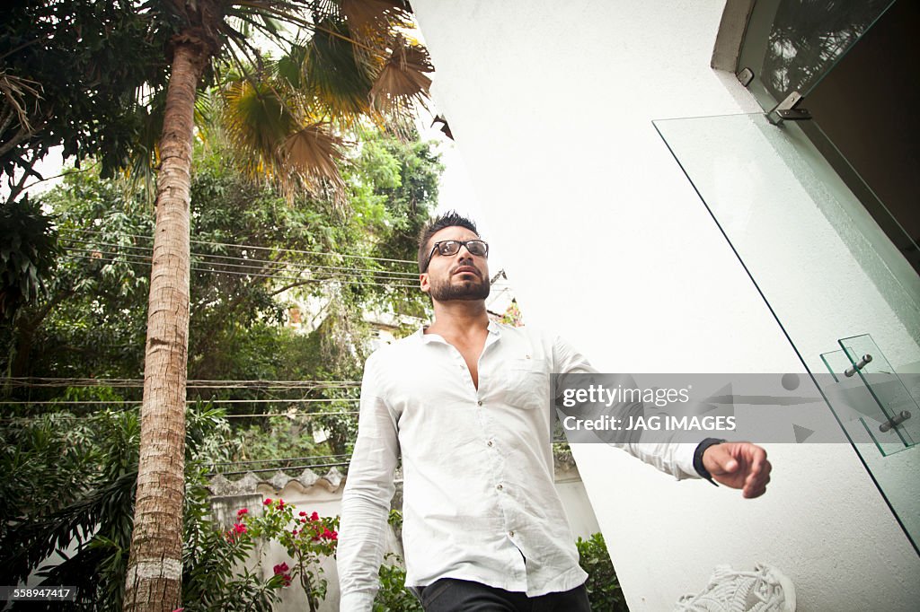 Man walking by door