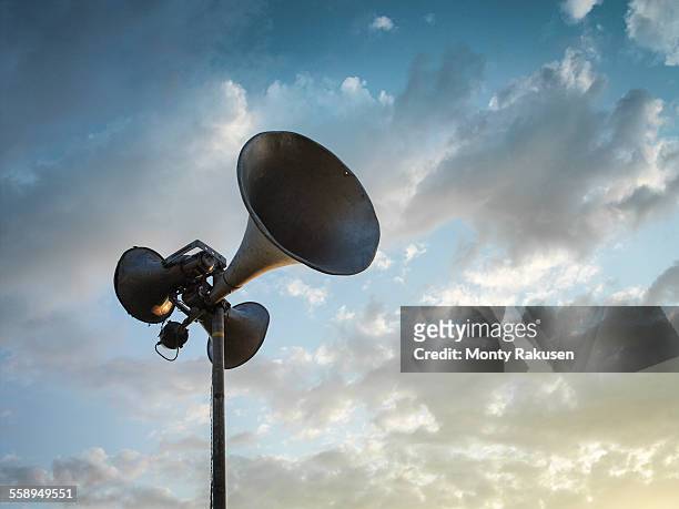 loud speaker against sky - megaphone stock pictures, royalty-free photos & images