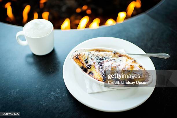 pudding and coffee by restaurant open fire - bread pudding stock pictures, royalty-free photos & images