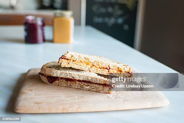 toasted sandwiches on kitchen counter - brotzeitbrett stock-fotos und bilder
