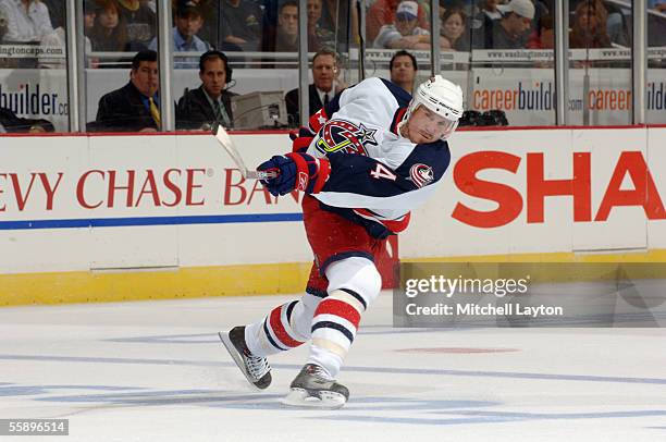 Defenseman Bryan Berard of the Columbus Blue Jackets shoots the puck against the Washington Capitals during the NHL game on October 5, 2005 at MCI...