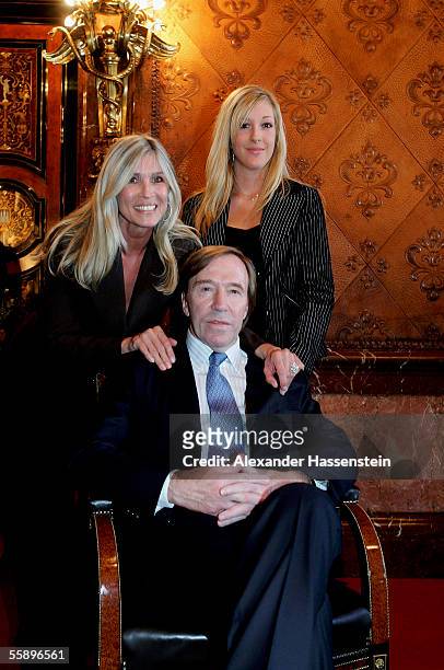 Guenther Netzer poses with his wife Elvira Netzer and daughter Alana Netzer during the reception of the Senate of Hamburg at City Hall October 11,...