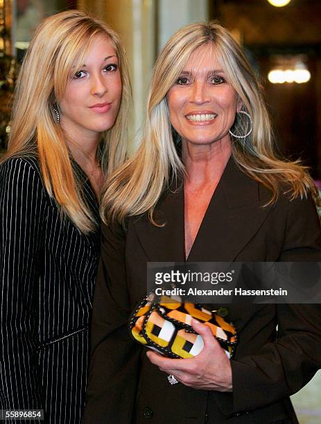 Elvira Netzer , wife of Guenther Netzer, and their daughter Alana Netzer pose during the reception of the Senate of Hamburg at City Hall October 11,...