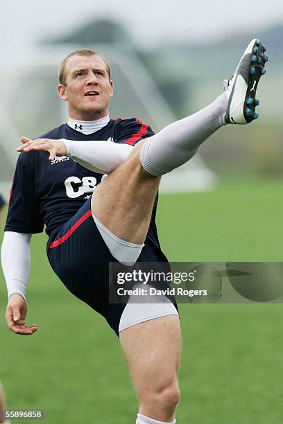 Mike Tindall kicks the ball upfield during the Gloucester rugby training at Hartpury College on October 11, 2005 in Gloucester, England.