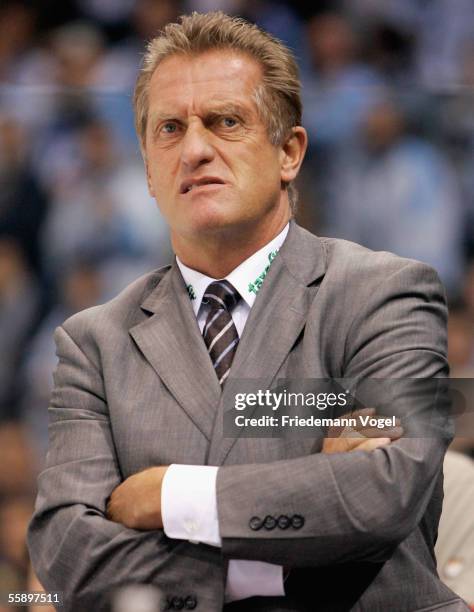 Coach Hans Zach of Cologne looks on during the DEL Bundesliga match between Hamburg Freezers and Cologne Haie at the Color Line Arena on October 11,...