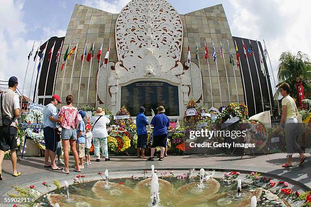 Bomb vicitims family pay their resepects during the memorial service to mark the annnivesary of the 2002 bombings at the Bomb Memorial at Kuta on...