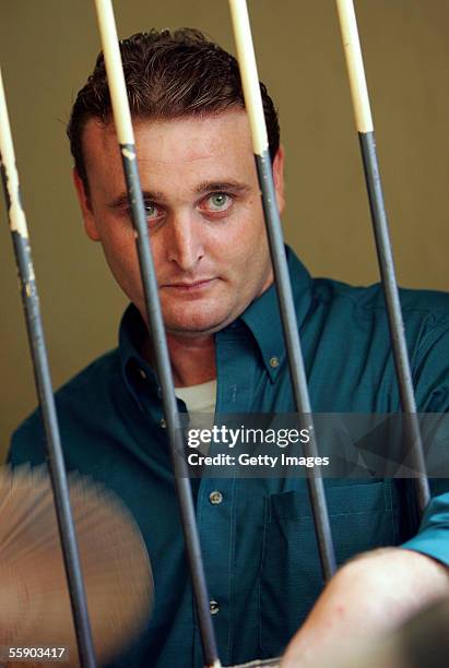 Australian Martin Stephens waits in the holding cell in the Denpasar District Court at the beginning of his trial on October 12, 2005 in Denpasar,...