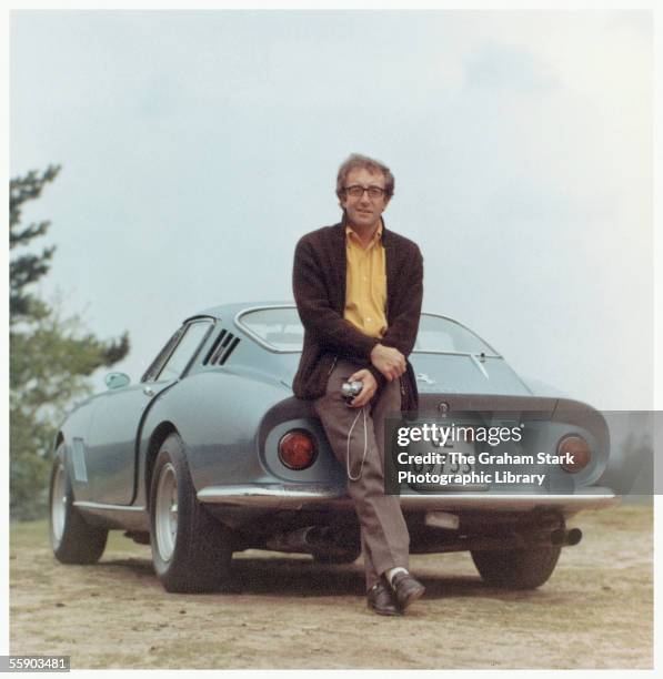 British comic actor Peter Sellers with his Ferrari 275 GTB, circa 1965.