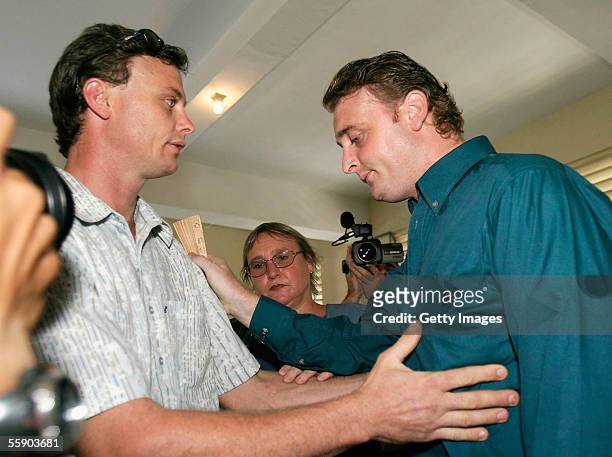Australian Martin Stephens greets his brother, Kevin, in Denpasar District Court at the beginning of his trial on October 12, 2005 in Denpasar,...