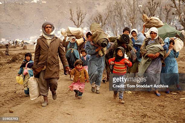 Kurdish refugees photographed at a camp in the mountains near Isikveren, Turkey. The camp straddled the Turkish-Iraq border and was a refuge for...