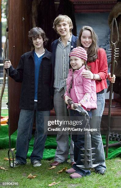 London, UNITED KINGDOM: Skandar Keynes, William Moseley, Georgie Henley and Anna Popplewell posing for pictures at the press launch for "The...