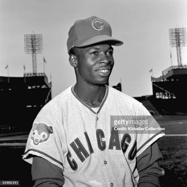 Outfielder Lou Brock, of the Chicago Cubs, poses for a portrait prior to a game in 1962 against the New York Mets at the Polo Grounds in New York,...