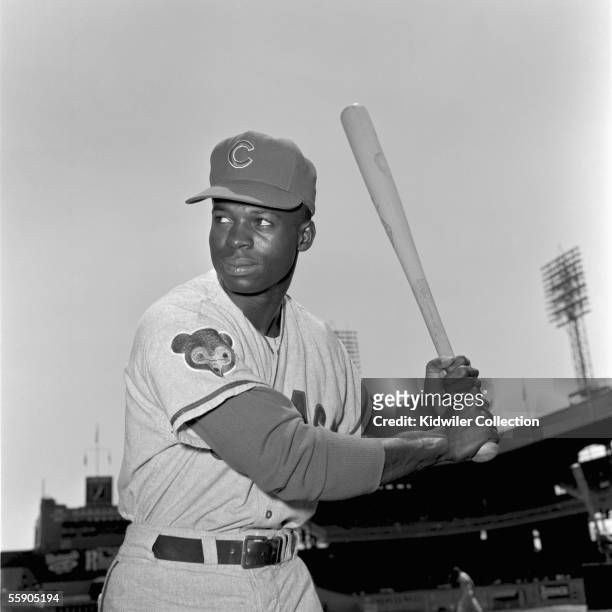 Outfielder Lou Brock, of the Chicago Cubs, poses for a portrait prior to a game in 1962 against the New York Mets at the Polo Grounds in New York,...