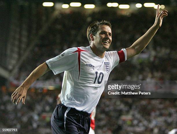 Michael Owen of England celebrates scoring the first goal the World Cup qualifying match between England and Poland at Old Trafford on October 12...