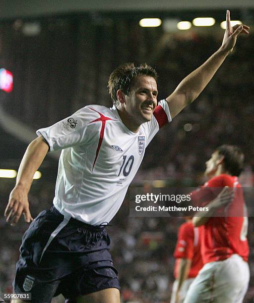 Michael Owen of England celebrates scoring the first goal the World Cup qualifying match between England and Poland at Old Trafford on October 12,...