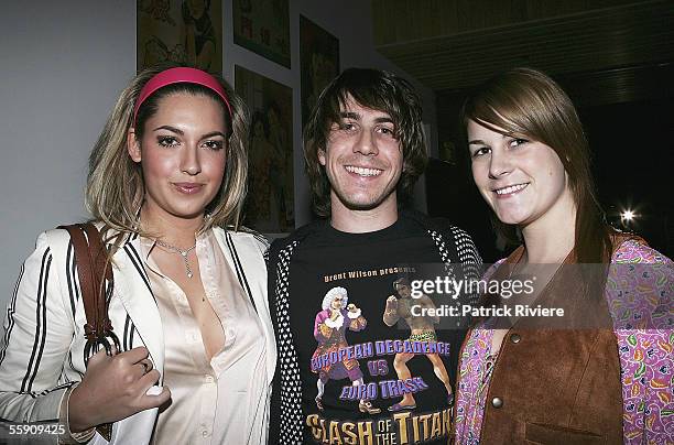 Fashion Designer Brent Wilson and friends Victoria Montamo and Annika Burtess attend the Robert Rosen Fashion Plate Exhibition at Westfield Bondi...