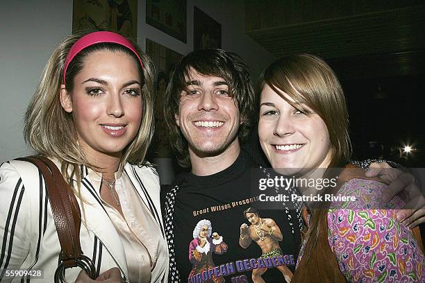 Fashion Designer Brent Wilson and friends Victoria Montamo and Annika Burtess attend the Robert Rosen Fashion Plate Exhibition at Westfield Bondi...