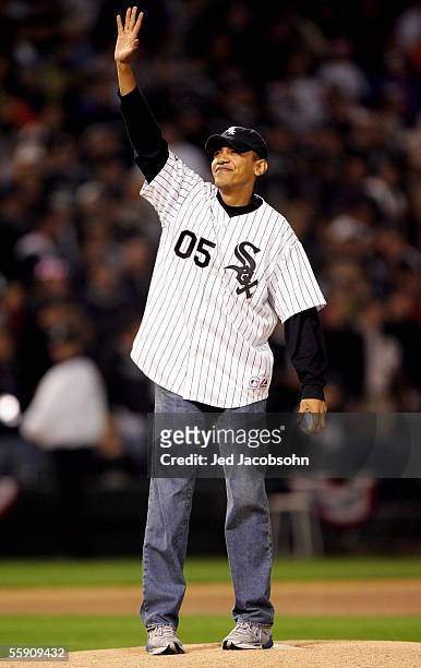 Senator for Illinois, Barack Obama, waves to the crowd before throwing out the ceremonial first pitch prior to the start of Game Two of the American...