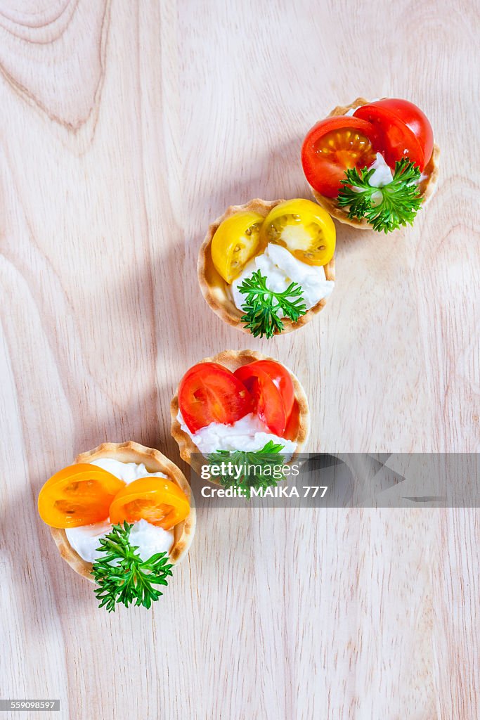 Appetizer of cherry tomatoes and creme cheese