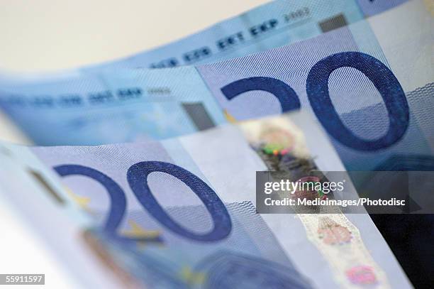 european currency: twenty euro bank notes - twenty euro note stock pictures, royalty-free photos & images