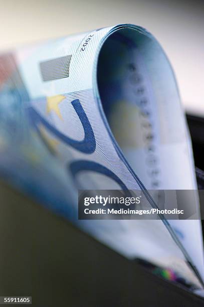 european currency: twenty euro bank note in wallet - twenty euro note stock-fotos und bilder