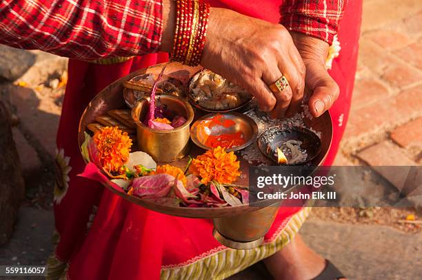 woman with hindu offering - religious offering stock pictures, royalty-free photos & images