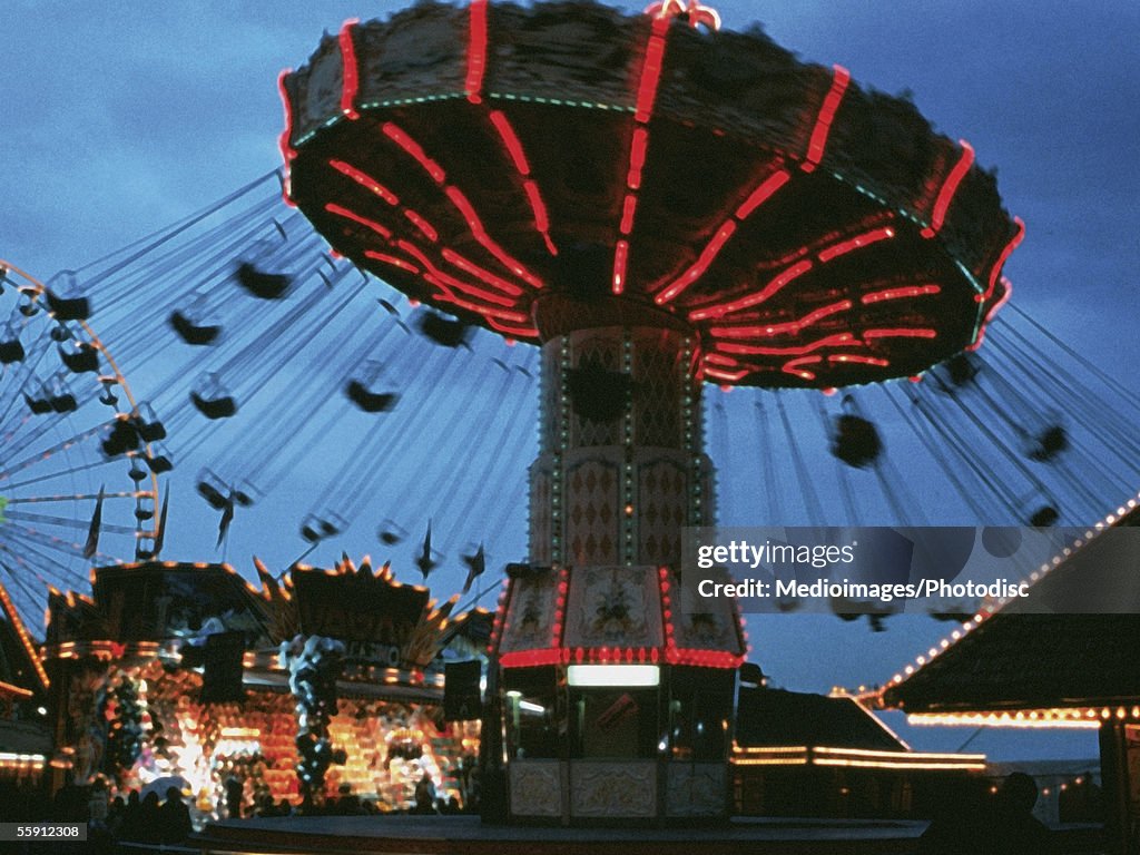 Low angle view of a ferris wheel in an amusement park