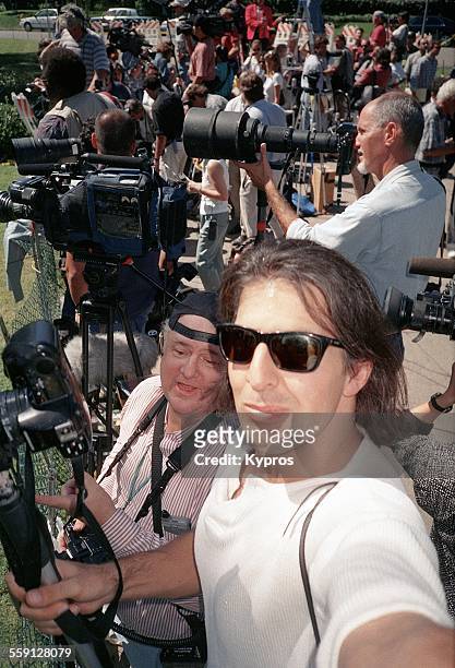 Photographers at the California home of American football star and actor O.J. Simpson, following the murders of Nicole Brown Simpson and Ronald...