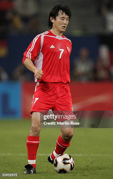 Jihai Sun of China runs with the ball during the friendly game between Germany and China at the AOL Arena on October 12, 2005 in Hamburg, Germany.