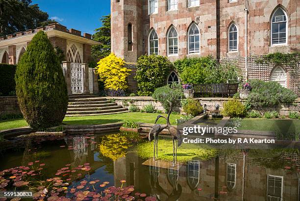 garden pool at cholmondeley castle, cheshire - cheshire england ストックフォトと画像