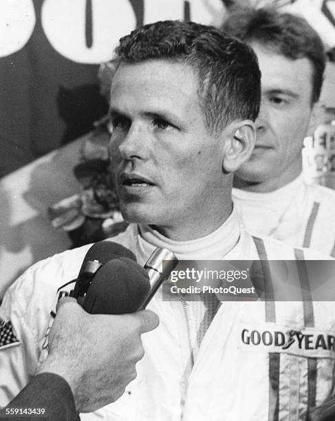 Race car driver Bobby Unser is interviewed after he won the Indianapolis 500, Indianapolis, Indiana, 1968.