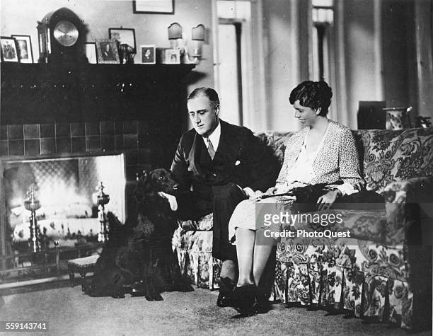 Portrait of American politician and US President Franklin D Roosevelt and his wife, First Lady Eleanor Roosevelt , as they pose at home with their...