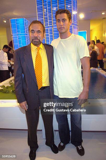 Real Estate Developer Jorge Perez and his son John Paul Perez pose at the party for the new Icon building October 11, 2005 in Miami, Florida.