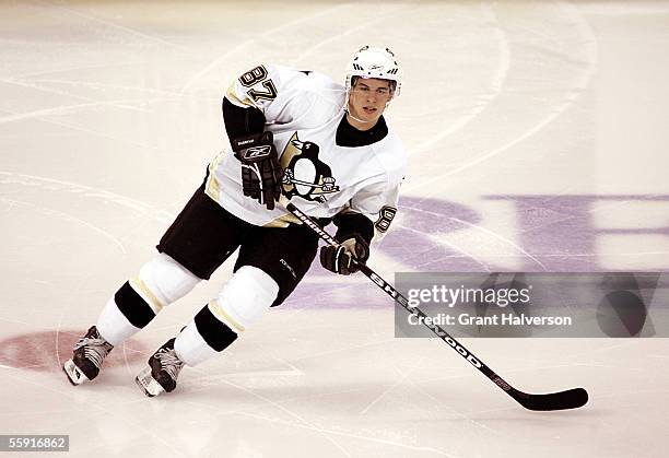 Sidney Crosby of the Pittsburgh Penguins goes to score against the Carolina Hurricanes during a NHL game on October 7, 2005 at the RBC Center in...