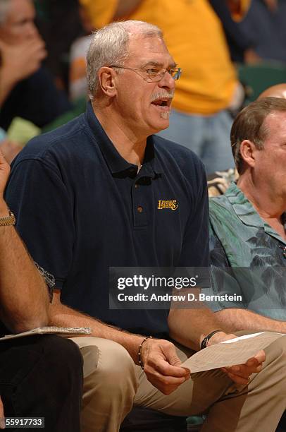 Head coach Phil Jackson of the Los Angeles Lakers coaches against the Golden State Warriors during a preseason game October 11, 2005 at Stan Sheriff...