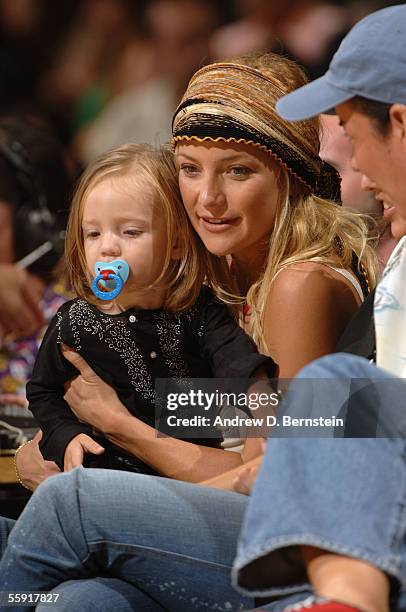 Actress Kate Hudson and her son Ryder Russell Robinson enjoy a preseason game between the Los Angeles Lakers and the Golden State Warriors October...