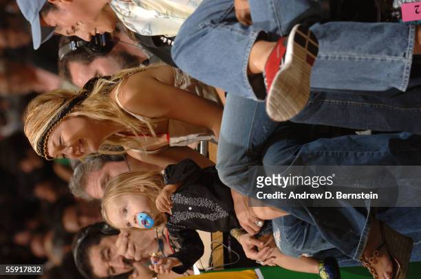 Actress Kate Hudson and her son Ryder Russell Robinson enjoy a preseason game between the Los Angeles Lakers and the Golden State Warriors October...