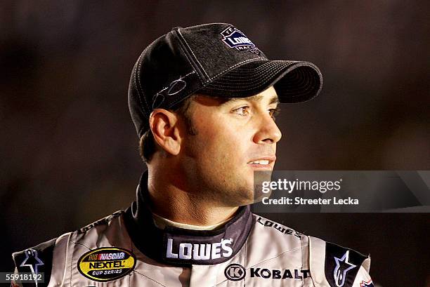 Jimmie Johnson, driver of the 48 Lowe's Chevrolet, watches during NASCAR Nextel Cup UAW-GM 500 Qualifying on October 13, 2005 at Lowe's Motor...