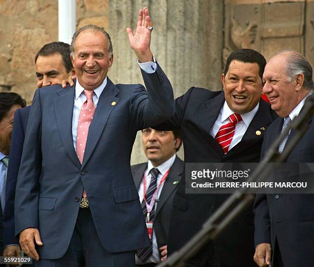 Spanish King Juan Carlos waves at a crowd accompanied by Venezuelan President Hugo Chavez , Chile's Presidente Ricardo Lagos and Spanish Prime...