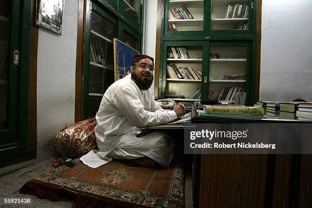 Mohammad Abdul Qavi the principal of a Pakistani religion school speaks in his office on July 2, 2005 in Multan, Pakistan. Qavi holds the title of...